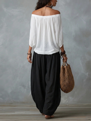 Witte Off-shoulder Top En Loszittende Lantaarnbroek Set