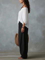 Witte Off-shoulder Top En Loszittende Lantaarnbroek Set